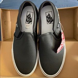 Pair of brand new leather slip-on black Vans in 10